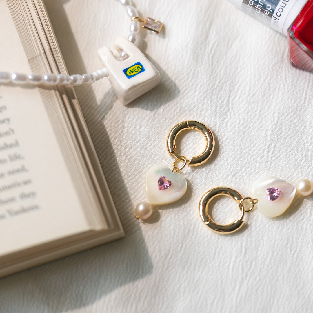 Pink gemstone and mother-of-pearl earrings