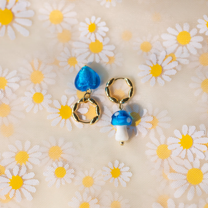 Blue glass heart and mushroom earrings