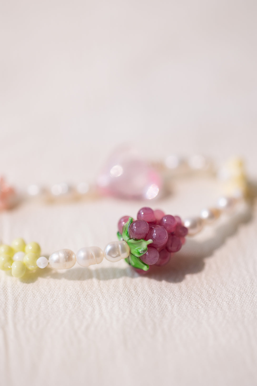 Heart and grape pearl necklace