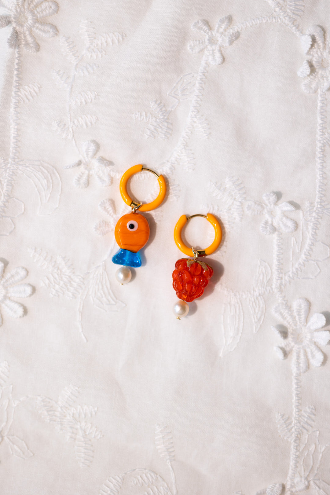 Raspberry and fish earrings