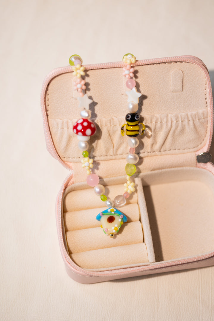 Bee and log cabin beaded necklace